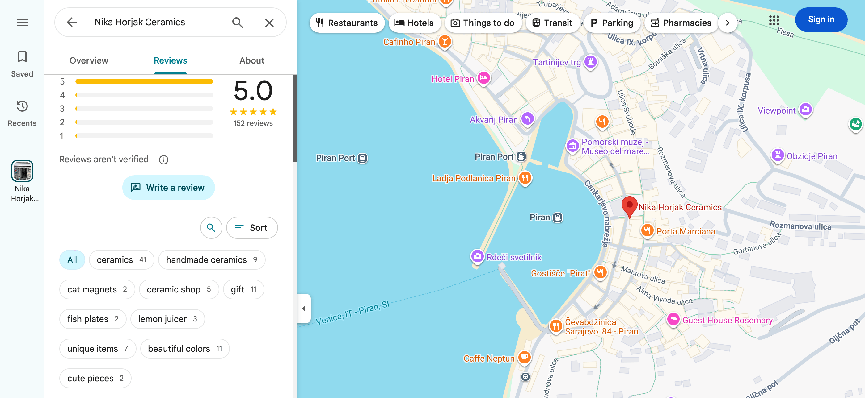 The Google Maps reviews panel for Nika Horjak Ceramics: a 5.0 rating, 152 reviews with the entire histogram on five stars, topic chips like ceramics and lemon juicer, and the map pin on Goriška ulica in Piran.
